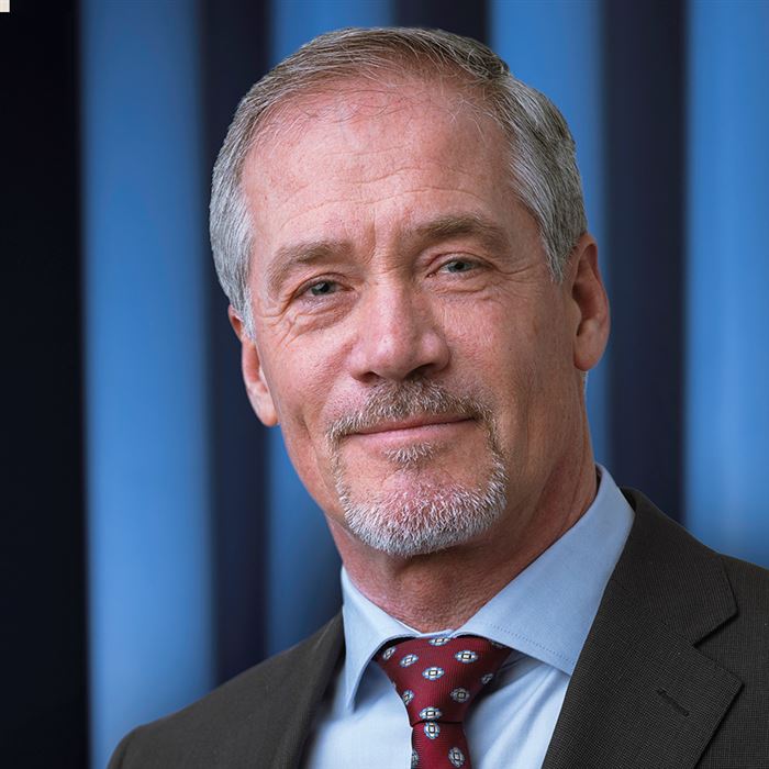 Porträttbild av kontorschefen.