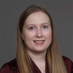 Porträttbild av medarbetare på bankkontoret.