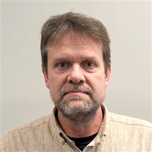 Porträttbild av medarbetare på bankkontoret.