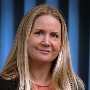 Porträttbild av medarbetare på bankkontoret.