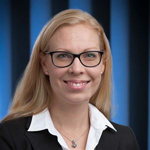 Porträttbild av medarbetare på bankkontoret.