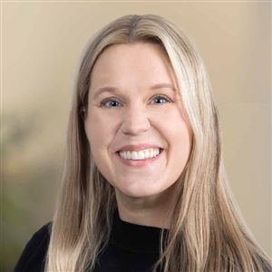 Porträttbild av medarbetare på bankkontoret.