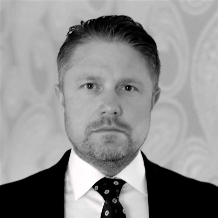 Porträttbild av kontorschefen.