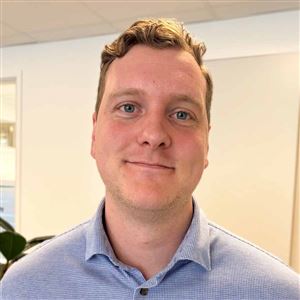 Porträttbild av medarbetare på bankkontoret.