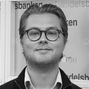 Porträttbild av medarbetare på bankkontoret.