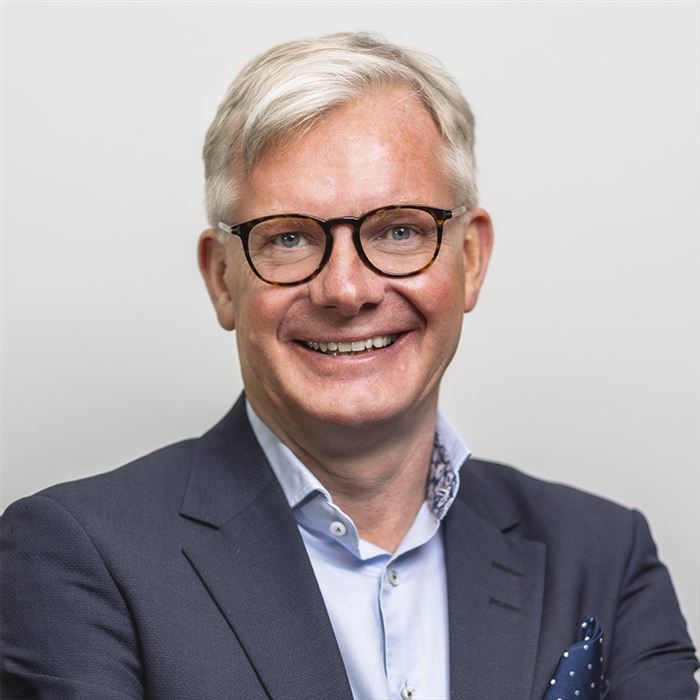 Porträttbild av kontorschefen. 