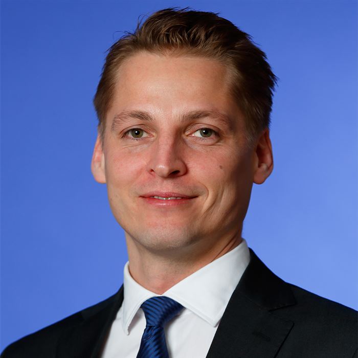 Porträttbild av kontorschefen.