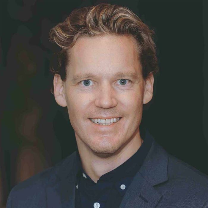 Porträttbild av kontorschefen.