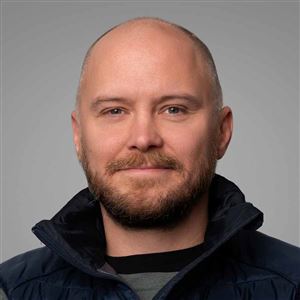 Porträttbild av medarbetare på bankkontoret.