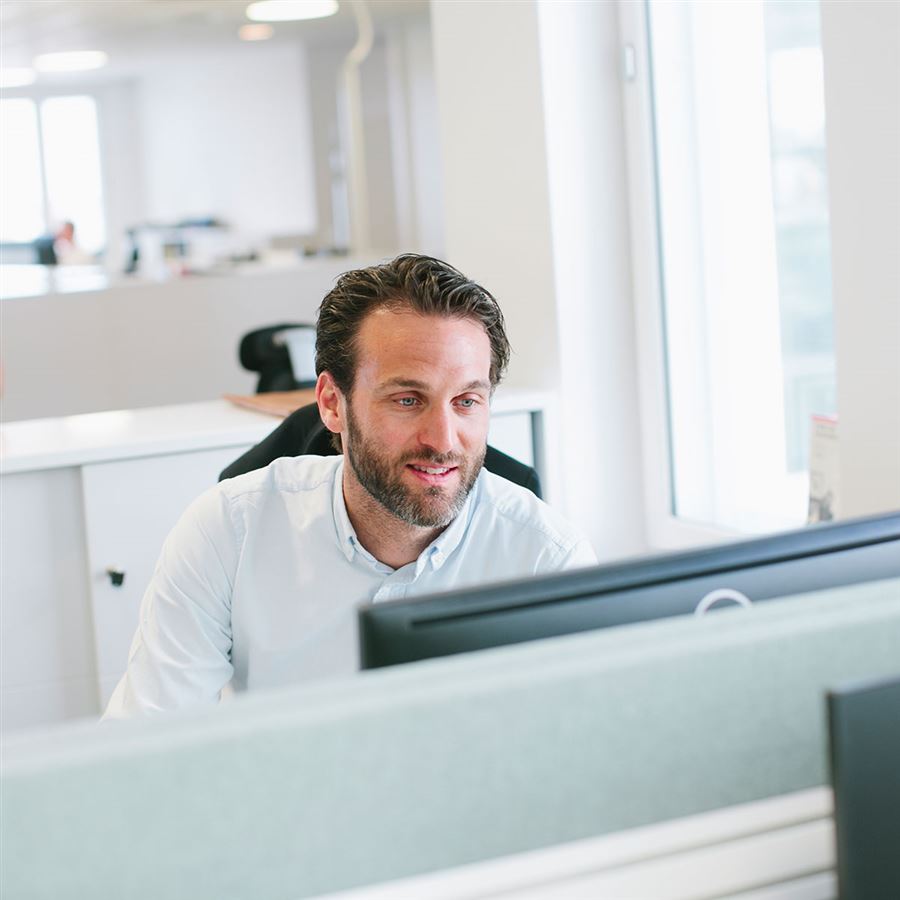 A man at his computer