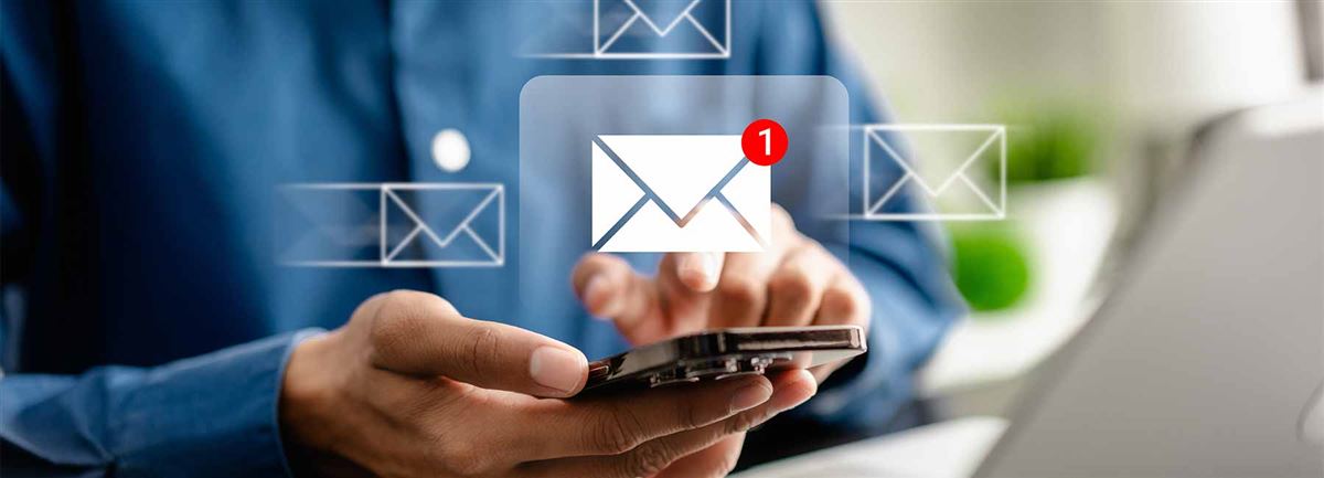 A person is reading an email on a mobile phone.