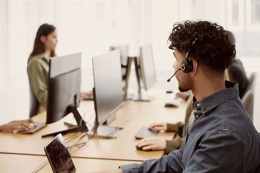 A man who works in a call center.